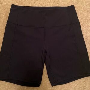 RBX black biker shorts with side pockets, stretchy and will fit you like a glove